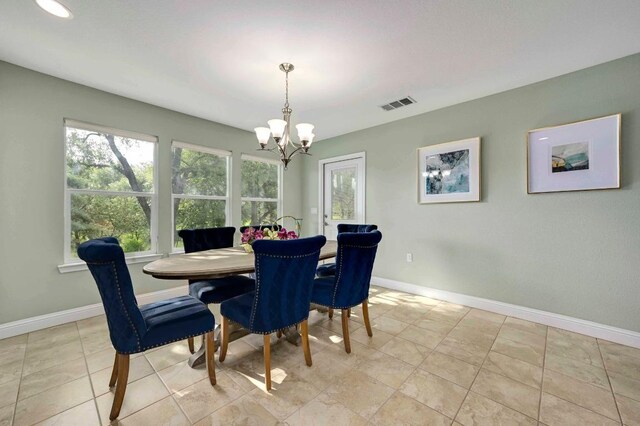 319 Salado Creek Ln, Georgetown, TX 78633 - dining room featuring a chandelier and baseboards