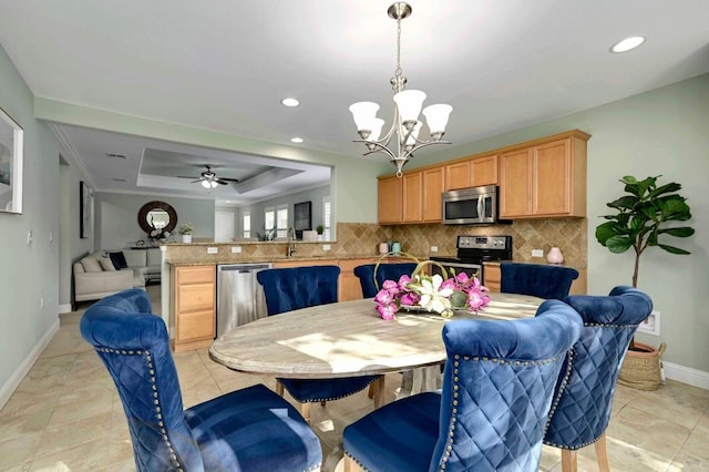 319 Salado Creek Ln, Georgetown, TX 78633 - dining area featuring a chandelier, a tray ceiling, recessed lighting, and ceiling fan