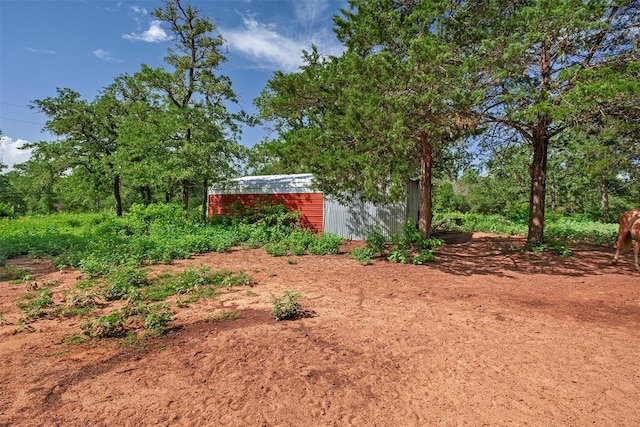 1231 Peach Creek Rd, Waelder, TX 78959 - view of yard featuring an outdoor structure