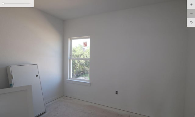 3609 Helena Way, Leander, TX 78641 - empty room with a wall unit AC and unfinished concrete floors