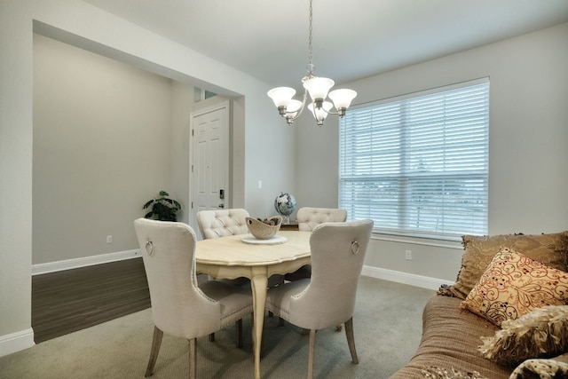 187 Glass Mountains Way, Dripping Springs, TX 78620 - carpeted dining space featuring a chandelier and baseboards