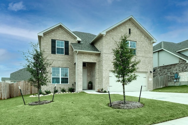 187 Glass Mountains Way, Dripping Springs, TX 78620 - traditional-style home with an attached garage, concrete driveway, and brick siding
