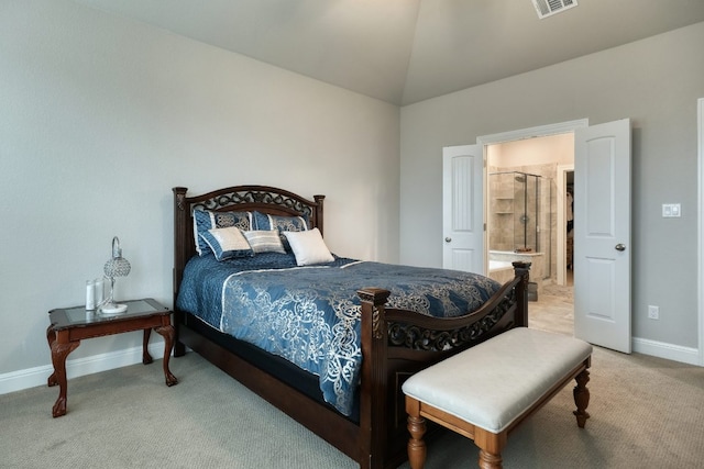 187 Glass Mountains Way, Dripping Springs, TX 78620 - bedroom with light colored carpet, connected bathroom, and vaulted ceiling