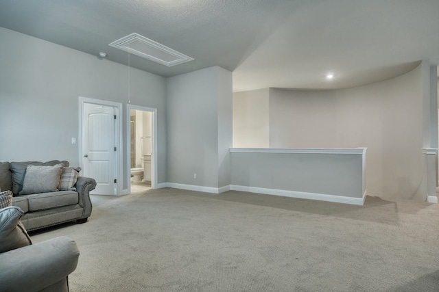 187 Glass Mountains Way, Dripping Springs, TX 78620 - living room featuring attic access and carpet floors