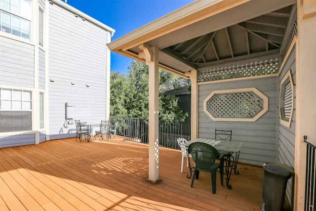 3111 Tom Green St Unit 105, Austin, TX 78705 - wooden deck featuring outdoor dining space