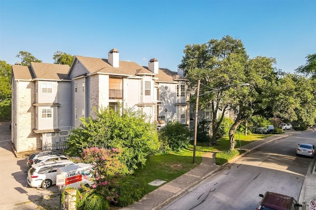 3111 Tom Green St Unit 105, Austin, TX 78705 - view of building exterior featuring a residential view