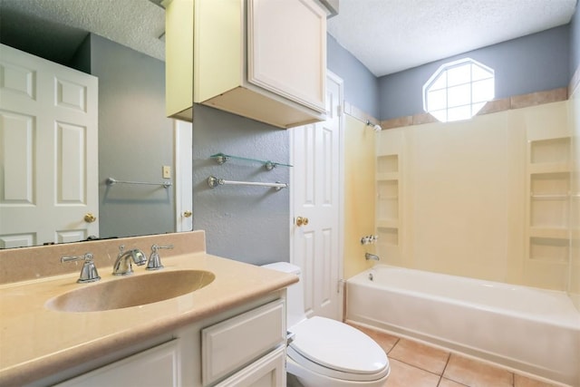 3111 Tom Green St Unit 105, Austin, TX 78705 - bathroom featuring a textured ceiling, vanity, shower / washtub combination, and tile patterned flooring