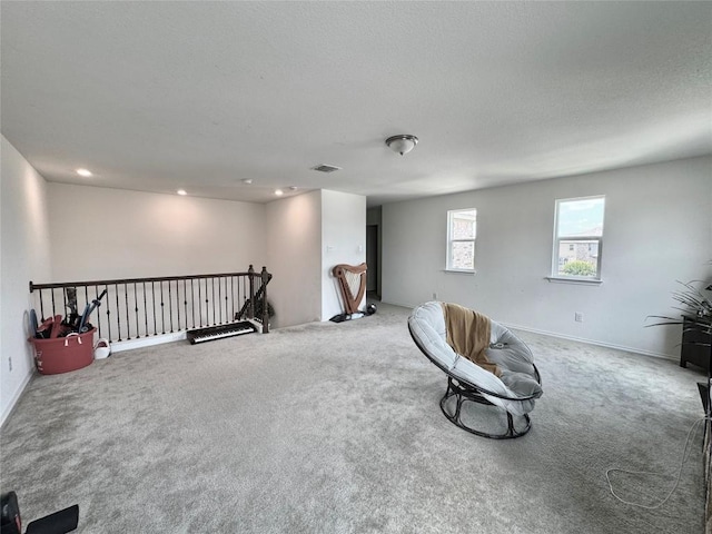 1121 Arbor Acres Loop, Leander, TX 78641 - unfurnished room featuring an upstairs landing, carpet flooring, and recessed lighting