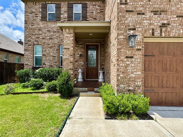 1121 Arbor Acres Loop, Leander, TX 78641 - doorway to property featuring brick siding