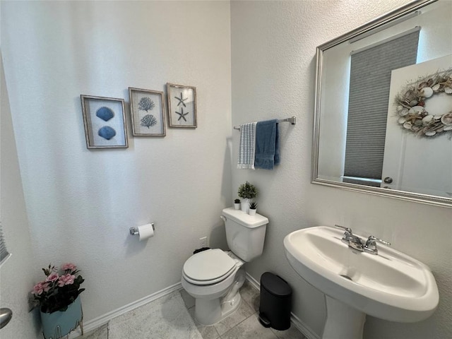 1121 Arbor Acres Loop, Leander, TX 78641 - half bathroom with a sink and tile patterned flooring