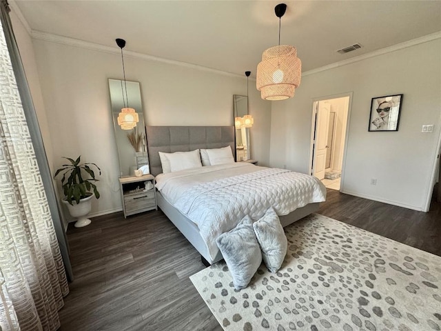 1121 Arbor Acres Loop, Leander, TX 78641 - bedroom with dark wood finished floors and ornamental molding