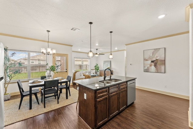 7606 Hickman St, Temple, TX 76502 - kitchen with stainless steel dishwasher, dark brown cabinets, dark stone countertops, a chandelier, and dark wood-type flooring