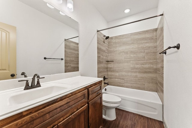 7606 Hickman St, Temple, TX 76502 - full bathroom with vanity, shower / bath combination, and wood finished floors