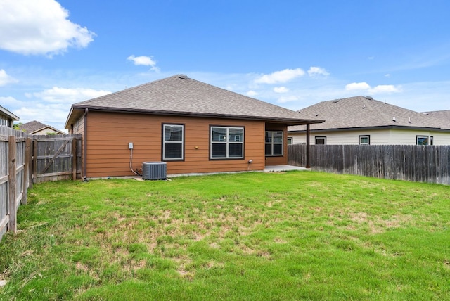 7606 Hickman St, Temple, TX 76502 - back of house featuring a fenced backyard, a patio area, and roof with shingles