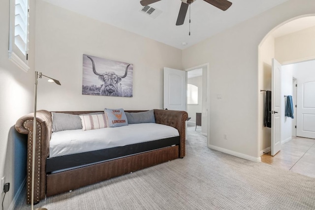 114 Reflection Bay Ct, Austin, TX 78738 - bedroom featuring arched walkways, carpet floors, and a ceiling fan