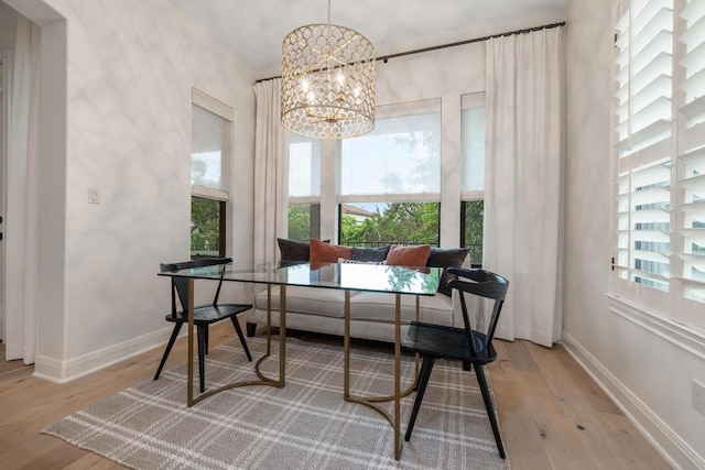 114 Reflection Bay Ct, Austin, TX 78738 - office area with wood finished floors and a chandelier