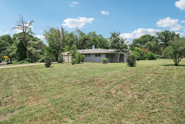 3806 Las Cienega Blvd, Temple, TX 76502 - view of grassy yard with a garage
