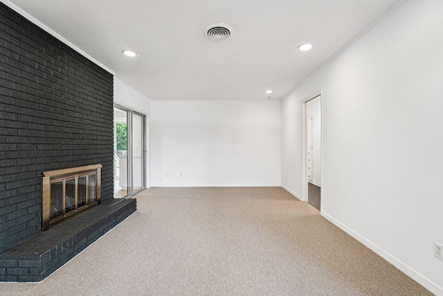 3806 Las Cienega Blvd, Temple, TX 76502 - unfurnished living room with a brick fireplace, carpet, and recessed lighting