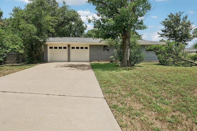 3806 Las Cienega Blvd, Temple, TX 76502 - view of front of house with driveway, an attached garage, and brick siding