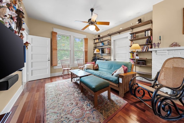 1110 Travis Heights Blvd, Austin, TX 78704 - living area with ceiling fan, hardwood / wood-style floors, and a brick fireplace