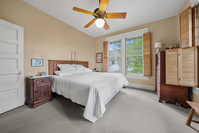 1110 Travis Heights Blvd, Austin, TX 78704 - bedroom with light carpet, lofted ceiling, and a ceiling fan