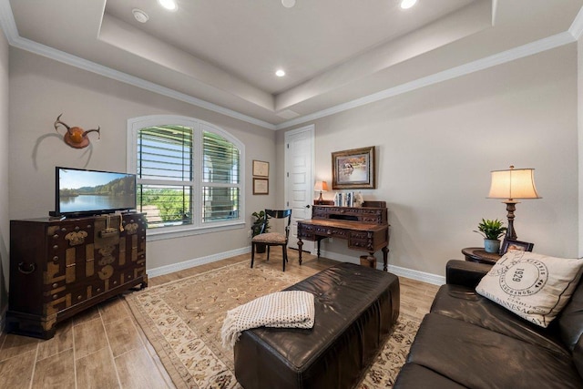 105 Clear Springs Ct, Marble Falls, TX 78654 - living area featuring a tray ceiling, recessed lighting, light wood-type flooring, and crown molding