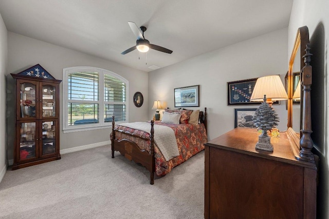 105 Clear Springs Ct, Marble Falls, TX 78654 - bedroom featuring light carpet and a ceiling fan