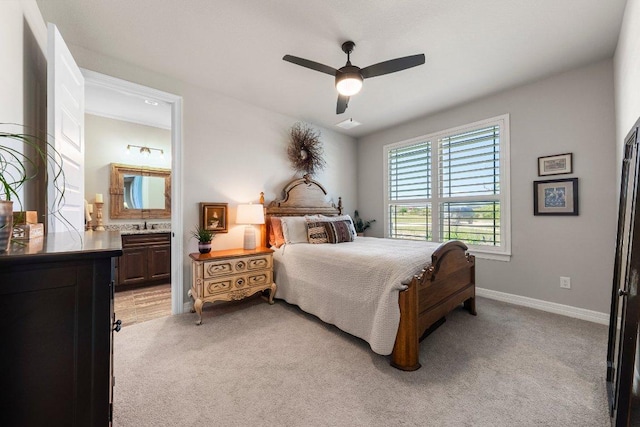 105 Clear Springs Ct, Marble Falls, TX 78654 - bedroom featuring light carpet, connected bathroom, and ceiling fan