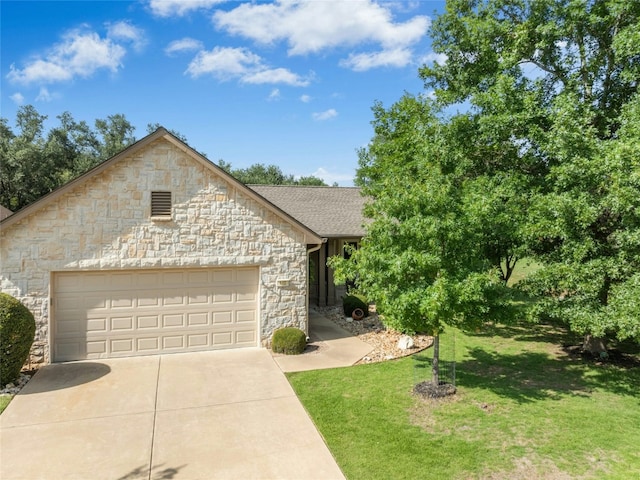 140 Whispering Wind Dr, Georgetown, TX 78633 - view of front of house featuring stone siding, a front lawn, driveway, an attached garage, and a shingled roof