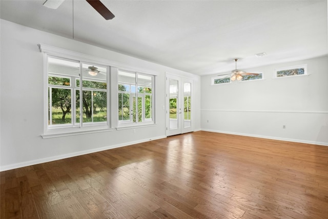140 Whispering Wind Dr, Georgetown, TX 78633 - unfurnished room with ceiling fan and hardwood / wood-style flooring