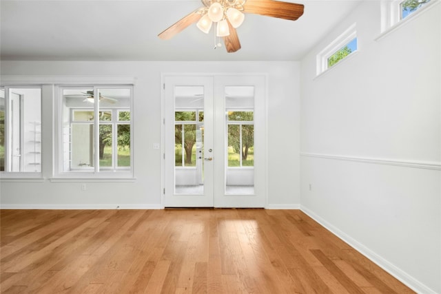 140 Whispering Wind Dr, Georgetown, TX 78633 - doorway featuring ceiling fan, french doors, and wood finished floors