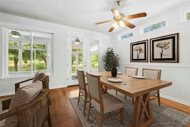 140 Whispering Wind Dr, Georgetown, TX 78633 - dining area with ceiling fan, healthy amount of natural light, and hardwood / wood-style flooring