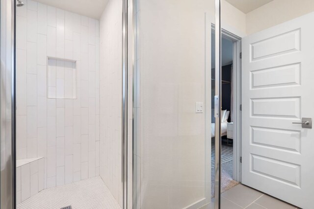 6204 Hickman Ave Unit A, Austin, TX 78723 - bathroom with a stall shower, connected bathroom, and tile patterned floors