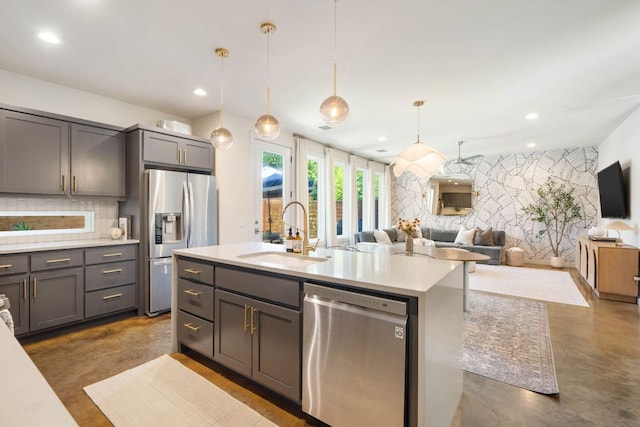 6204 Hickman Ave Unit A, Austin, TX 78723 - kitchen with appliances with stainless steel finishes, decorative backsplash, light countertops, open floor plan, and concrete flooring