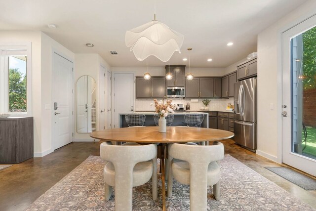6204 Hickman Ave Unit A, Austin, TX 78723 - dining space with concrete floors and recessed lighting