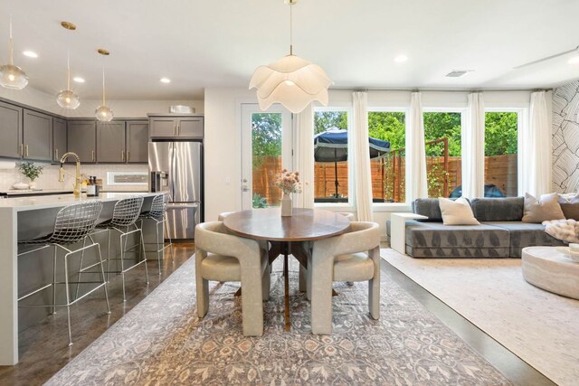 6204 Hickman Ave Unit A, Austin, TX 78723 - dining space with recessed lighting and finished concrete flooring