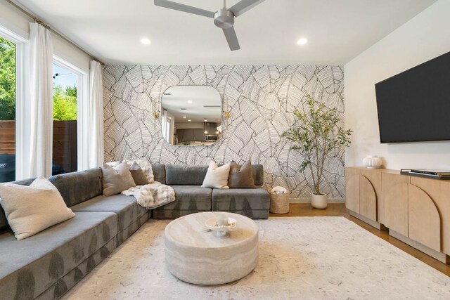 6204 Hickman Ave Unit A, Austin, TX 78723 - living area with an accent wall, a ceiling fan, wallpapered walls, and recessed lighting
