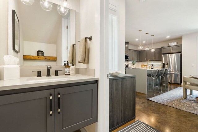 6204 Hickman Ave Unit A, Austin, TX 78723 - bathroom with finished concrete flooring and vanity