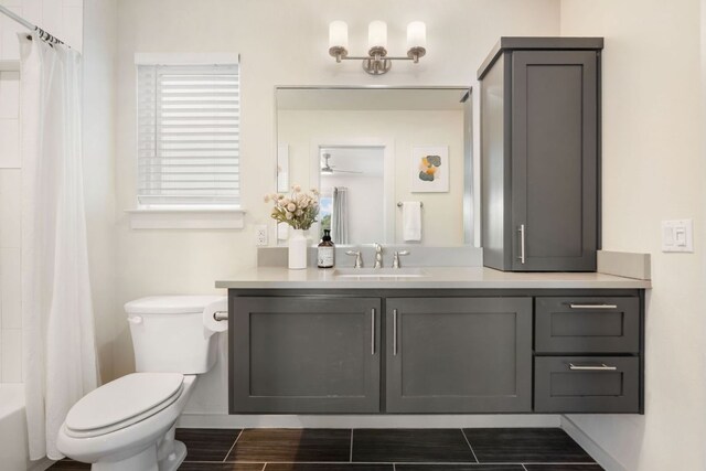 6204 Hickman Ave Unit A, Austin, TX 78723 - bathroom with vanity, wood finished floors, and shower / bath combo with shower curtain