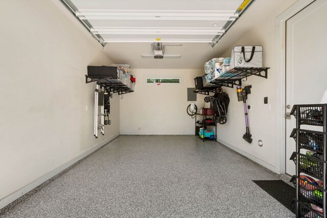 6204 Hickman Ave Unit A, Austin, TX 78723 - garage featuring electric panel and a garage door opener