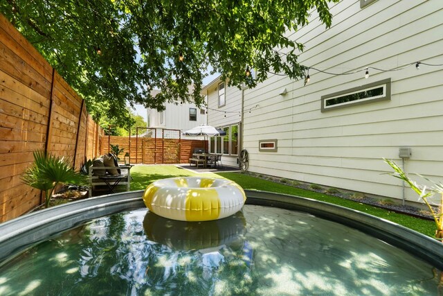 6204 Hickman Ave Unit A, Austin, TX 78723 - view of pool with a fenced backyard and a patio area