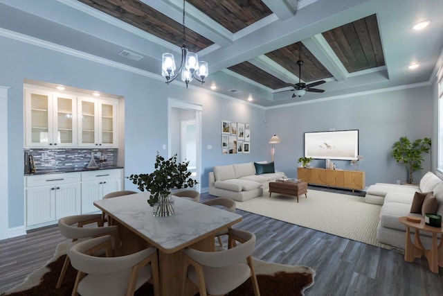 249 Pecan Meadow Ln, Belton, TX 76513 - dining space with beamed ceiling, dark wood-style floors, crown molding, a chandelier, and a ceiling fan