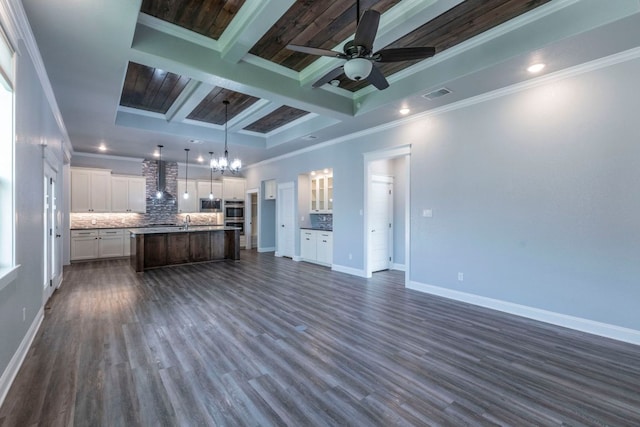 249 Pecan Meadow Ln, Belton, TX 76513 - kitchen with backsplash, wall chimney range hood, beamed ceiling, a chandelier, and open floor plan