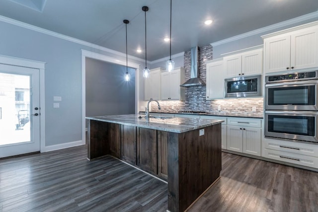 249 Pecan Meadow Ln, Belton, TX 76513 - kitchen featuring stainless steel appliances, wall chimney exhaust hood, decorative backsplash, dark wood finished floors, and ornamental molding