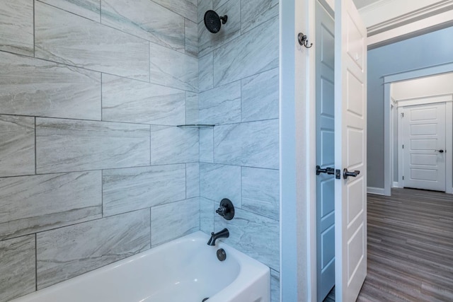 249 Pecan Meadow Ln, Belton, TX 76513 - bathroom with bathing tub / shower combination and wood finished floors