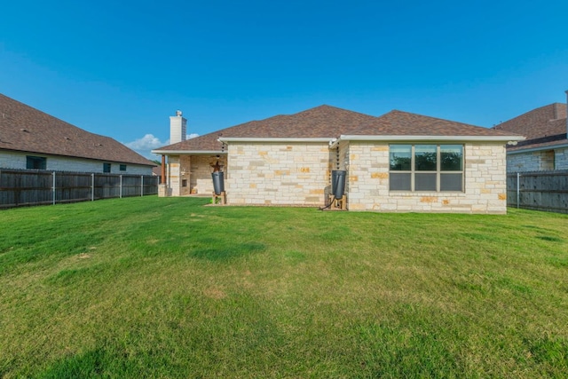 249 Pecan Meadow Ln, Belton, TX 76513 - back of house featuring a fenced backyard, a chimney, stone siding, and a shingled roof