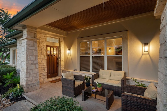 7709 Waldon Dr, Austin, TX 78750 - patio terrace at dusk featuring an outdoor living space