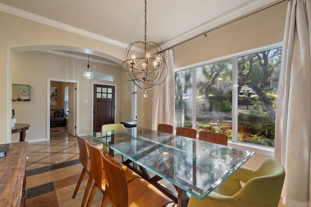 7709 Waldon Dr, Austin, TX 78750 - dining room with inlaid floor details, arched walkways, a chandelier, and crown molding
