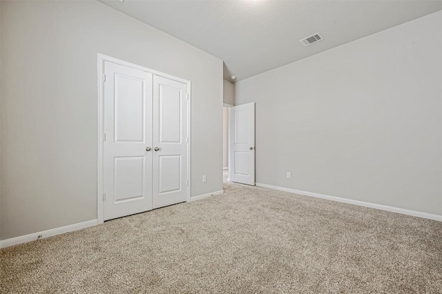 1017 Sundrops St, Leander, TX 78641 - unfurnished bedroom with light carpet and a closet