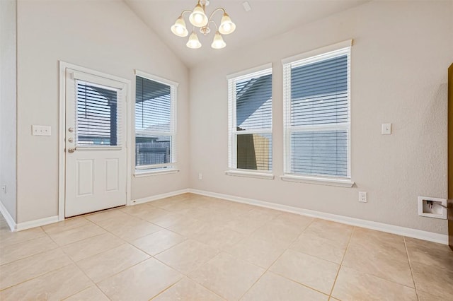 1017 Sundrops St, Leander, TX 78641 - unfurnished room featuring a chandelier, lofted ceiling, and light tile patterned flooring